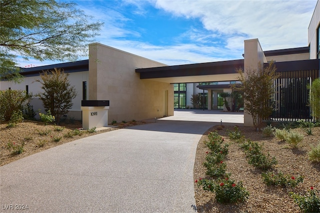 exterior space featuring a carport