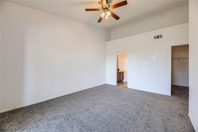 empty room featuring carpet and ceiling fan