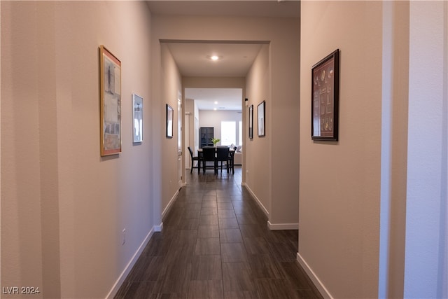 corridor featuring dark hardwood / wood-style floors