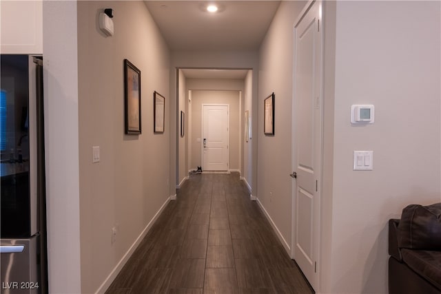 hallway featuring dark hardwood / wood-style flooring