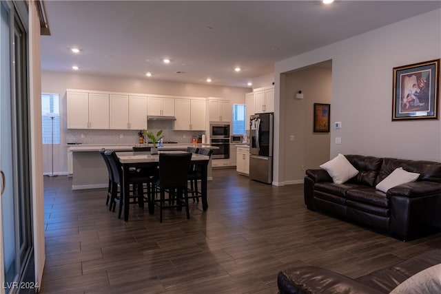 dining area featuring dark hardwood / wood-style flooring