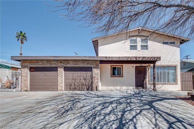 view of front of home with a garage