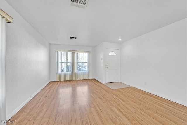 foyer with light hardwood / wood-style floors