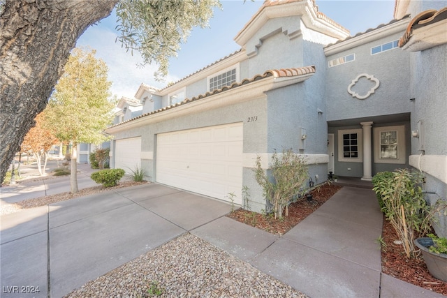 view of front of home with a garage