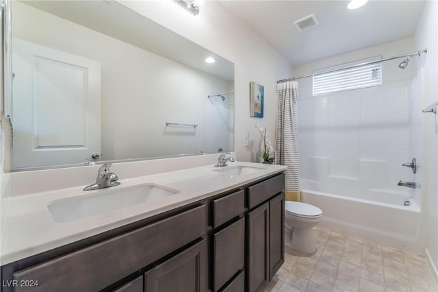 full bathroom with toilet, vanity, and shower / tub combo with curtain