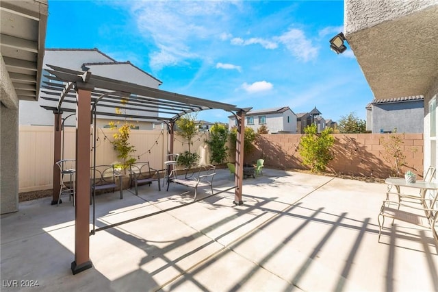 view of patio / terrace featuring a pergola