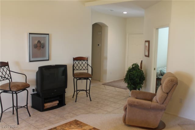 sitting room with light tile patterned flooring