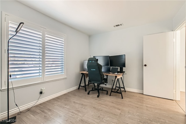 home office featuring light wood-type flooring