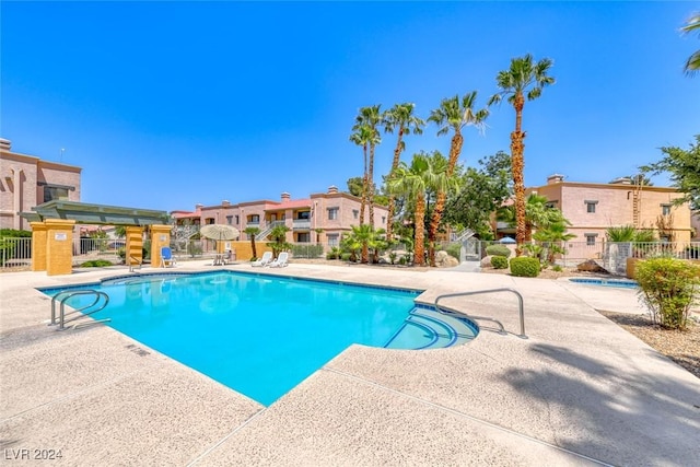 view of swimming pool featuring a patio