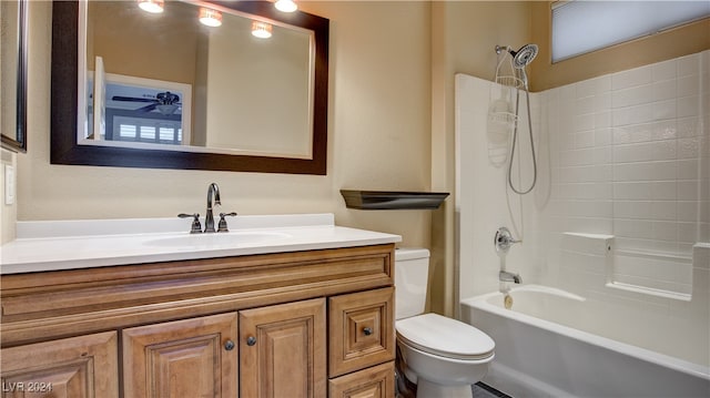 full bathroom featuring vanity, tub / shower combination, and toilet