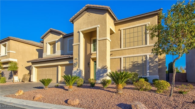 view of front of property featuring a garage