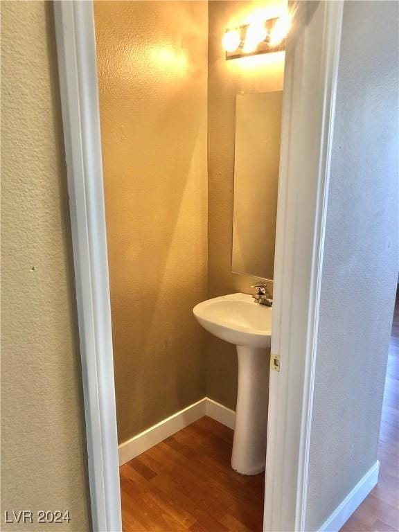 bathroom featuring hardwood / wood-style floors