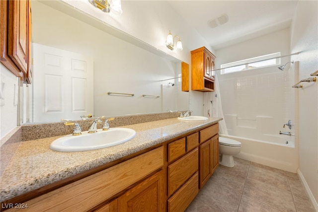 full bathroom featuring tile patterned flooring, shower / bathing tub combination, vanity, and toilet