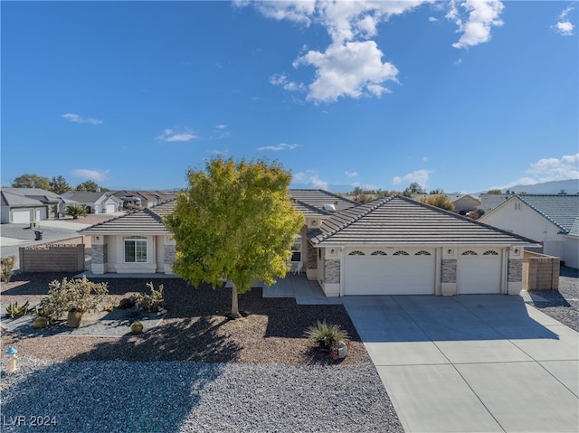 view of front of home with a garage