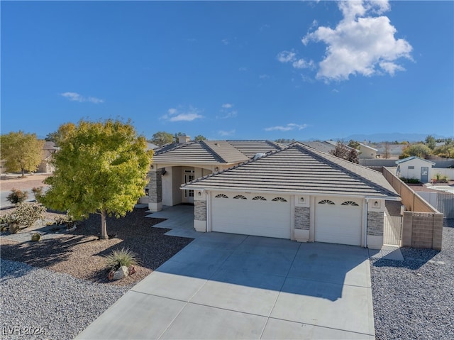 view of front of home with a garage