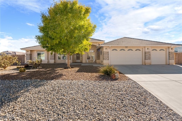 view of front of property featuring a garage