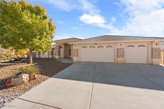 view of front of property featuring a garage