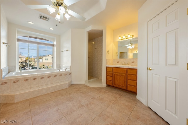 bathroom with shower with separate bathtub, vanity, tile patterned floors, and ceiling fan