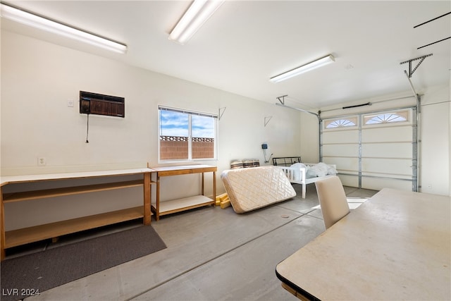 garage featuring an AC wall unit