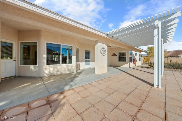 view of patio featuring a pergola