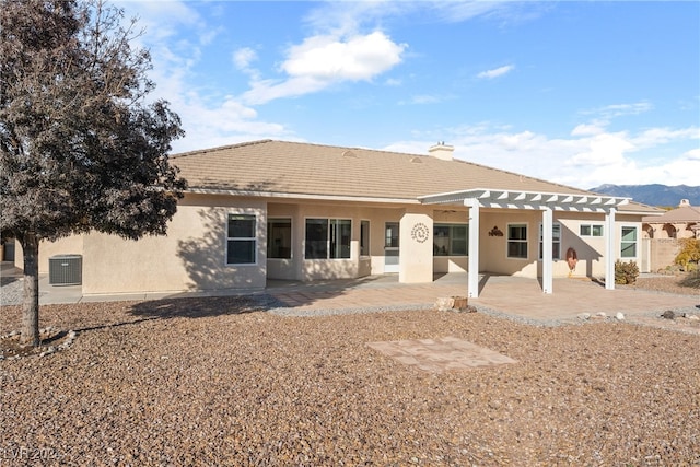 back of house featuring a patio and central AC unit