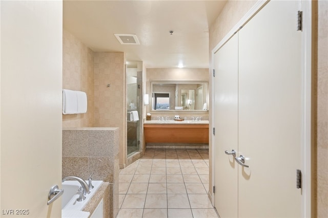 bathroom featuring a garden tub, visible vents, a stall shower, vanity, and tile patterned flooring