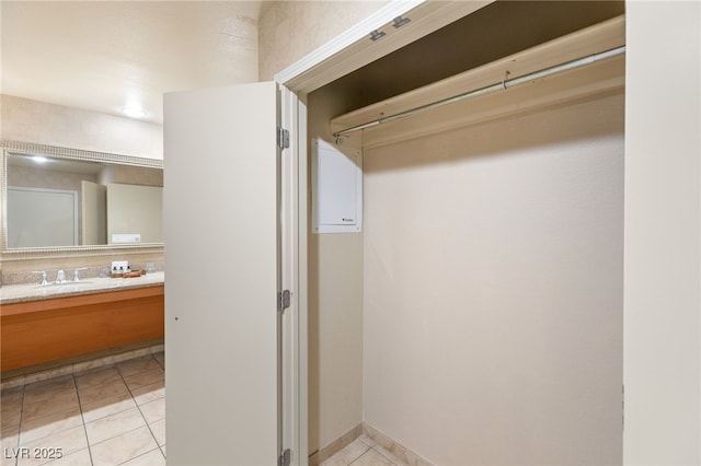 closet featuring a sink