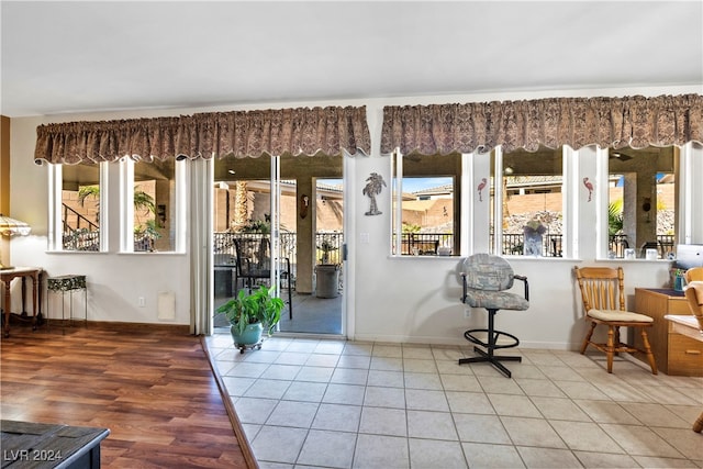 entryway featuring a wealth of natural light and tile patterned flooring