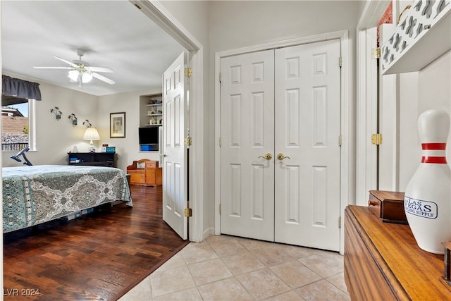 bedroom featuring light hardwood / wood-style flooring and ceiling fan