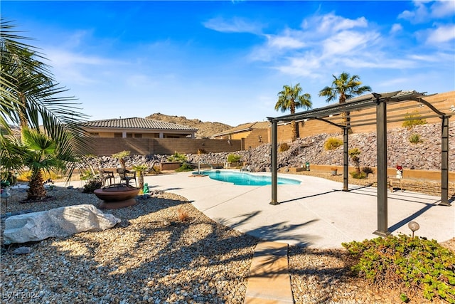 view of pool featuring a patio