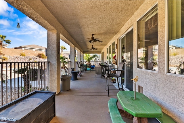 view of patio / terrace with ceiling fan