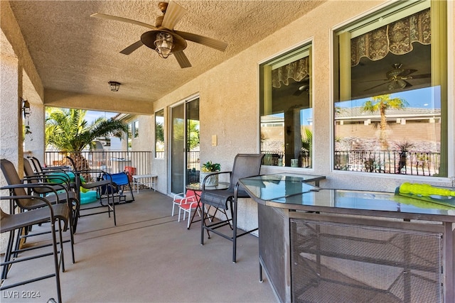 view of patio / terrace with ceiling fan