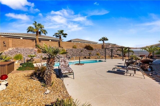 2349 Cottage View Ct, Laughlin, NV 89029 - view of pool with a fenced backyard, a pergola, and a patio
