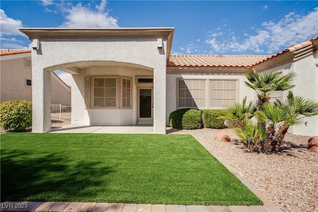 exterior space with a front yard