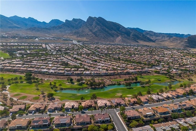 bird's eye view featuring a water and mountain view