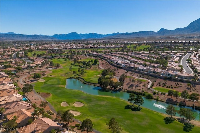 bird's eye view with a water and mountain view