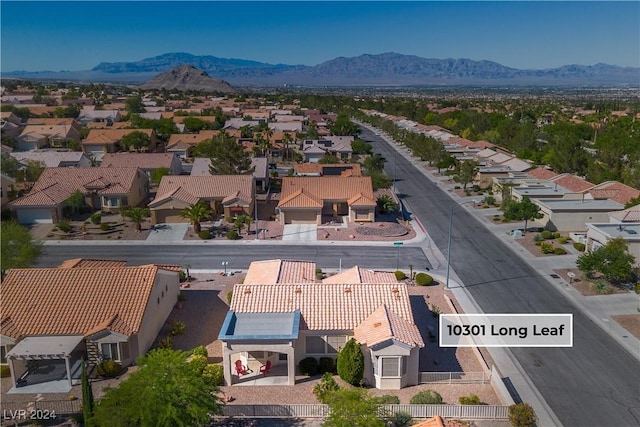 drone / aerial view featuring a mountain view