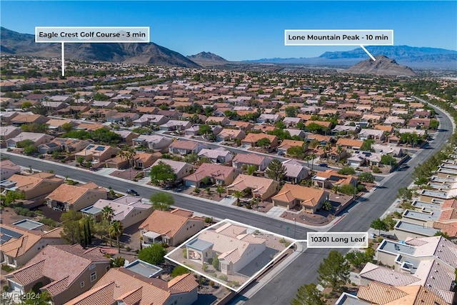 drone / aerial view featuring a mountain view