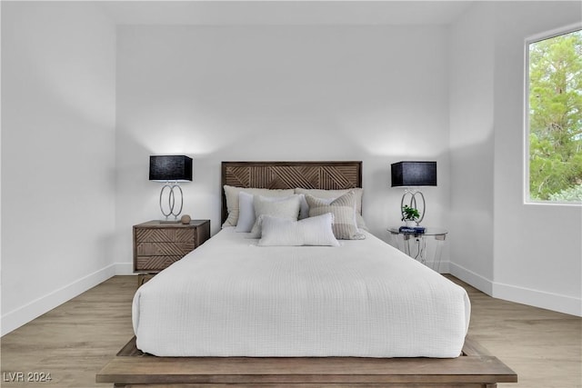 bedroom featuring light wood-type flooring