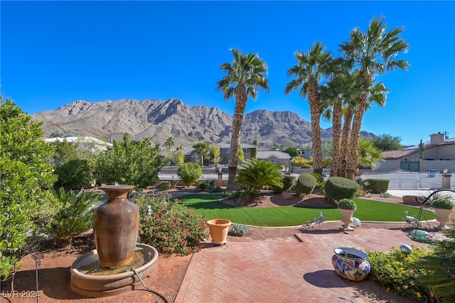 view of patio / terrace with a mountain view