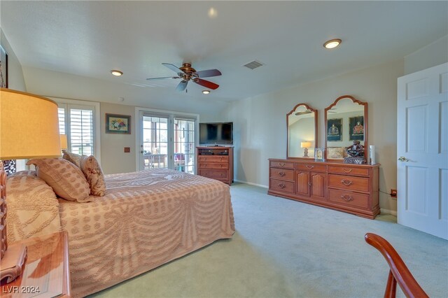 bedroom with ceiling fan and light colored carpet