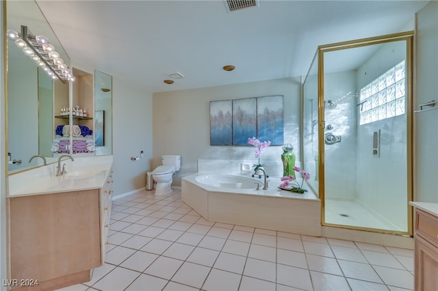 full bathroom featuring tile patterned flooring, vanity, separate shower and tub, and toilet