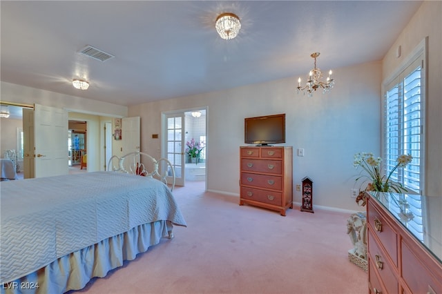 bedroom featuring a chandelier, light carpet, and multiple windows