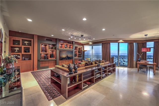 living room with wood walls