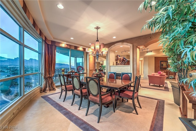 dining area with a notable chandelier