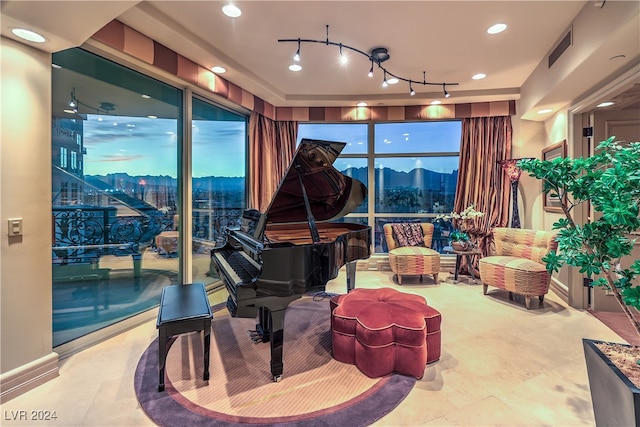 miscellaneous room featuring a mountain view