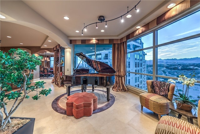 miscellaneous room featuring a mountain view and a chandelier