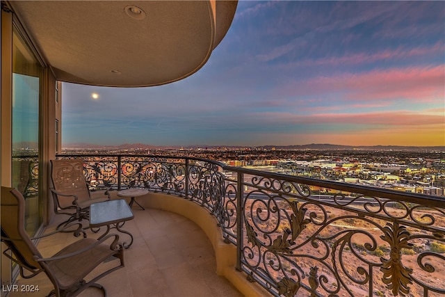 view of balcony at dusk