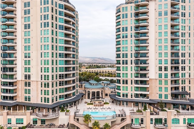 view of building exterior featuring a mountain view