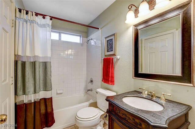 full bathroom featuring toilet, vanity, and shower / bath combo